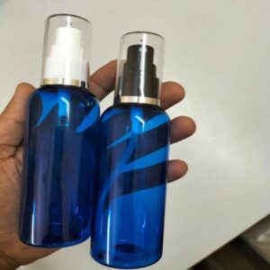 Cosmetic Round Pet Bottle with Silver Lining Spray Pump - Blue (100ml)